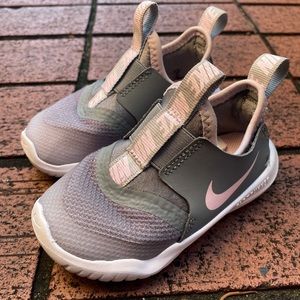 Kids pull on Nike shoe